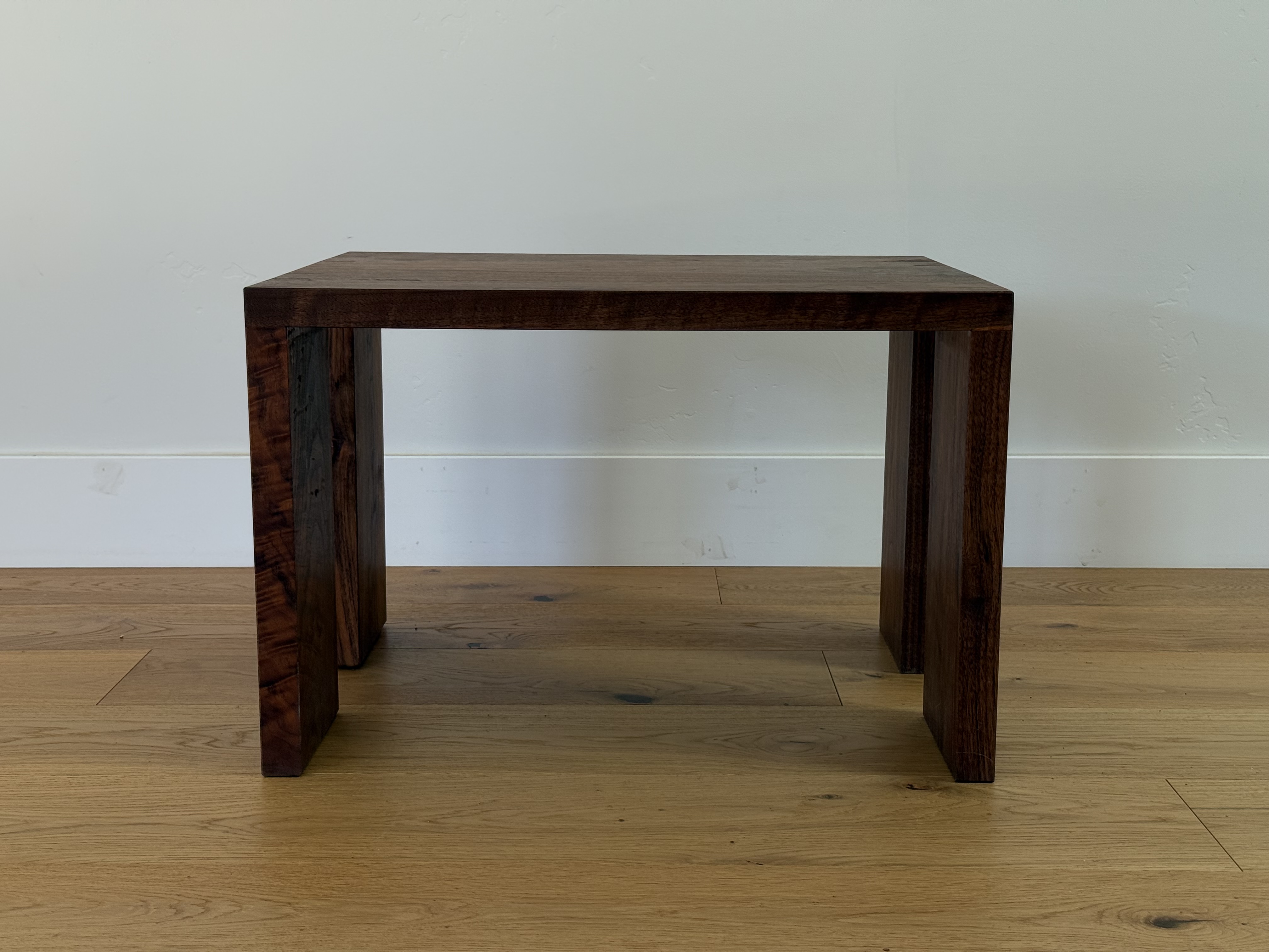 Walnut side table, matching the sofa frame